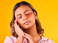 Woman, eye mask and beauty with skincare, dermatology and cosmetic product on yellow background. Peace, calm and self