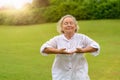 Woman with eyes closed doing breathing exercises