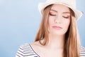 Woman face colorful eyes makeup, summer straw hat smiling Royalty Free Stock Photo