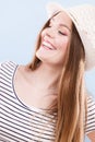 Woman face colorful eyes makeup, summer straw hat smiling Royalty Free Stock Photo