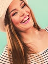 Woman face colorful eyes makeup, summer straw hat smiling Royalty Free Stock Photo