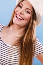 Woman face colorful eyes makeup, summer straw hat smiling Royalty Free Stock Photo