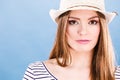 Woman face colorful eyes makeup, summer straw hat smiling Royalty Free Stock Photo