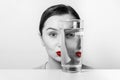 Woman Face Distortion In Water Glass