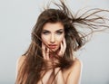 Woman face with hair motion on white background isolated Royalty Free Stock Photo