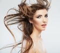 Woman face with hair motion on white background isolated Royalty Free Stock Photo