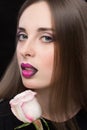 Woman face with lilac Lips and Rose Flower. Royalty Free Stock Photo