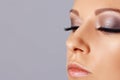Woman face with long eyelashes and smokey eyes make-up. Eyelash extensions, makeup, cosmetics, beauty Royalty Free Stock Photo