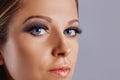Woman face with long eyelashes and smokey eyes make-up. Eyelash makeup, cosmetics, beauty Royalty Free Stock Photo