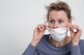 Woman with face mask protecting herself from coronavirus stock photo
