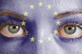 Woman face painted with European Union flag Royalty Free Stock Photo