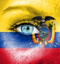 Woman face painted with flag of Ecuador