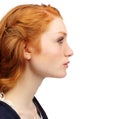 Woman, face profile and ginger hair with thinking and natural beauty in a studio. White background, young person and Royalty Free Stock Photo