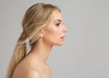 Woman Face Profile. Young Girl Portrait with Smooth healthy Skin. Model Facial Side View over Gray. Body and Neck Skin Care Royalty Free Stock Photo