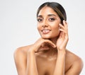 Woman Face Skin Care Cosmetic. Indian Beauty Model showing Perfect Chin and Cheekbones. Women Facial Treatment and Health Royalty Free Stock Photo