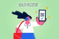 Woman in facemask show vaccination passport on mobile
