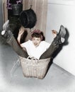 Woman falling into basket