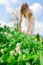 Woman farmer is checking maturing peas - spring time Royalty Free Stock Photo