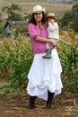 Woman Farmer With Her Son Royalty Free Stock Photo