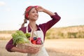 Woman farmer standing farmland smiling Female agronomist specialist farming agribusiness Happy positive caucasian worker Royalty Free Stock Photo