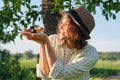 Woman farmer holding in hands two small newborn baby chickens Royalty Free Stock Photo