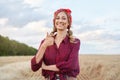 Woman farmer standing farmland smiling Female agronomist specialist farming agribusiness Happy positive caucasian worker Royalty Free Stock Photo
