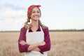 Woman farmer standing farmland smiling Female agronomist specialist farming agribusiness Happy positive caucasian worker Royalty Free Stock Photo