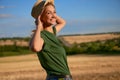 Woman farmer straw hat standing farmland smiling Female agronomist specialist farming agribusiness Happy positive caucasian worker Royalty Free Stock Photo