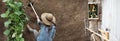 Woman farmer working with hoe in vegetable garden, hoeing the so Royalty Free Stock Photo