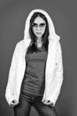 Woman fashion model. Fashion outfit. Pink eyeglasses. Keep calm and wear cool glasses. Cute Pretty girl hood jacket red