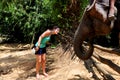 Woman feeding an elephant