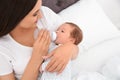 Woman feeding her baby from bottle Royalty Free Stock Photo