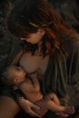 Woman feeding her small son Royalty Free Stock Photo