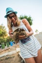 Woman feeding turtle