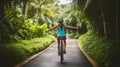 Woman feel free cycling on tropical park trail in summer, Generative AI