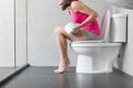 Woman feel pain with constipation