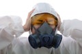 Woman feel strain in a chemical protective clothing and antigas mask with yellow glasses at isolated white background, Women