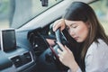 Woman feel tried and sleeping on a car