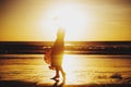 Woman feeling free meeting sun near the sea Royalty Free Stock Photo