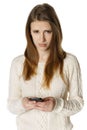 Woman is feeling sad while reading sms Royalty Free Stock Photo