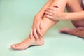 Woman feels strong foot pain isolated. People, healthcare and medicine concept