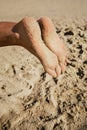 Woman feet closeup of girl relaxing on beach Royalty Free Stock Photo