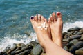 Woman feet closeup of girl relaxing on beach Royalty Free Stock Photo