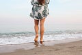 Woman feet walk slow life and relax on sand tropical beach with blue sky background. Vacation and holiday concept Royalty Free Stock Photo