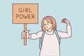 Woman feminist demonstrates sign with text girl power fighting for female rights. Vector image Royalty Free Stock Photo