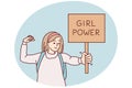 Woman feminist demonstrates sign with text girl power fighting for female rights. Vector image Royalty Free Stock Photo
