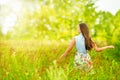 Woman in the field back rear view, Outdoor lifestyle in nature, Girl in Summer Green Field