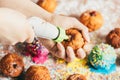 Woman filling homemade doughnut with red jam Royalty Free Stock Photo