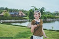 Woman filming with small personal camera