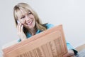 Woman With Finance Newspaper On Call